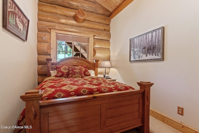 271 W Shore Ln, Sandpoint, ID 83864 - carpeted bedroom with rustic walls, lofted ceiling, baseboards, and wood ceiling