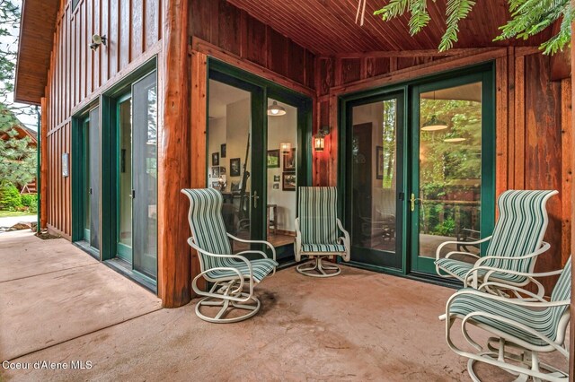 271 W Shore Ln, Sandpoint, ID 83864 - view of exterior entry with board and batten siding