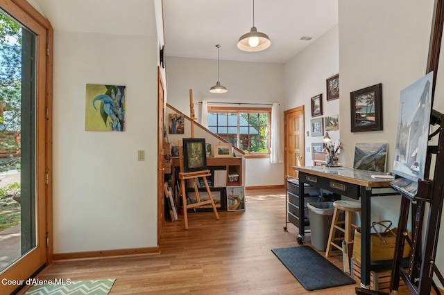 271 W Shore Ln, Sandpoint, ID 83864 - foyer with wood finished floors, baseboards, and stairs
