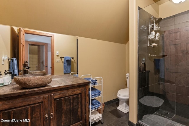 271 W Shore Ln, Sandpoint, ID 83864 - bathroom with a stall shower, toilet, and vanity