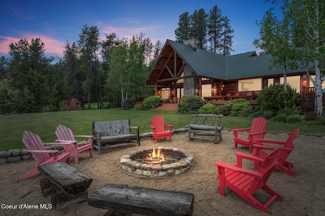271 W Shore Ln, Sandpoint, ID 83864 - view of patio / terrace with a fire pit