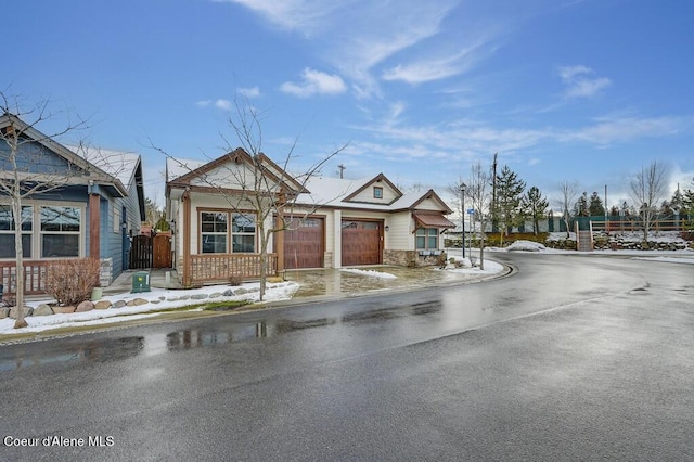 4362 N Meadow Ranch Ave, Coeur Dalene, ID 83815 - view of front of property featuring an attached garage and driveway