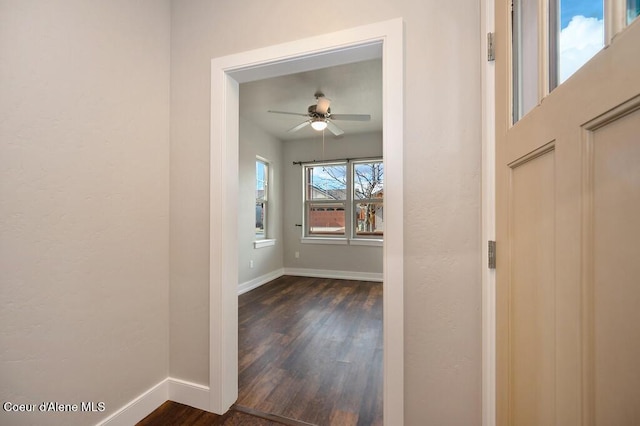 4362 N Meadow Ranch Ave, Coeur Dalene, ID 83815 - corridor featuring baseboards and dark wood-style floors