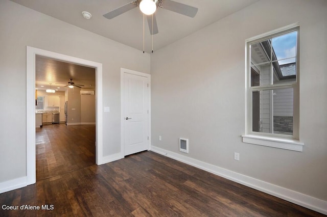 4362 N Meadow Ranch Ave, Coeur Dalene, ID 83815 - unfurnished room featuring a ceiling fan, dark wood-style flooring, baseboards, and a smoke detector