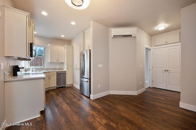4362 N Meadow Ranch Ave, Coeur Dalene, ID 83815 - kitchen featuring stainless steel appliances, dark wood-style floors, light countertops, baseboards, and recessed lighting