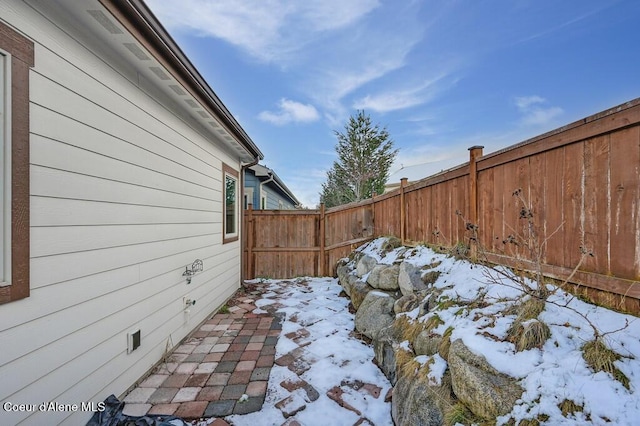 4362 N Meadow Ranch Ave, Coeur Dalene, ID 83815 - yard layered in snow featuring fence