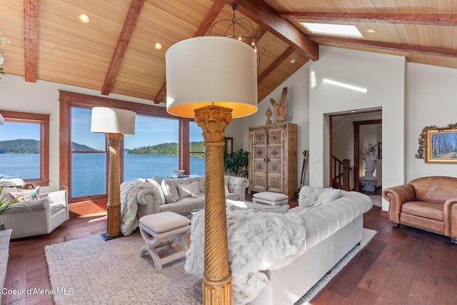 bedroom with wooden ceiling, wood-type flooring, a water view, recessed lighting, and a skylight