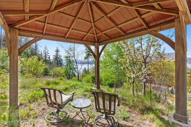 view of yard featuring a gazebo and a mountain view