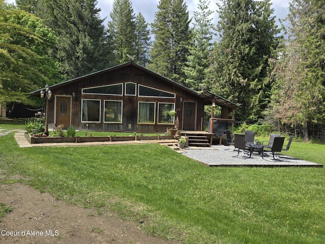295 A St, Sandpoint, ID 83864 - view of front facade featuring a front yard and a patio