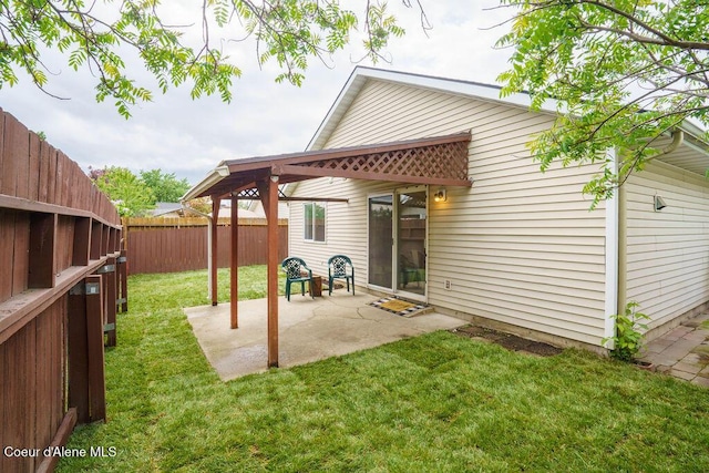 rear view of property featuring a patio area