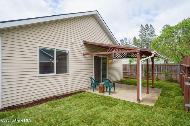 rear view of house featuring a patio