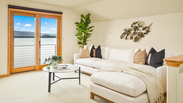 3361 Bottle Bay Rd, Sagle, ID 83860 - living area featuring lofted ceiling and a water view