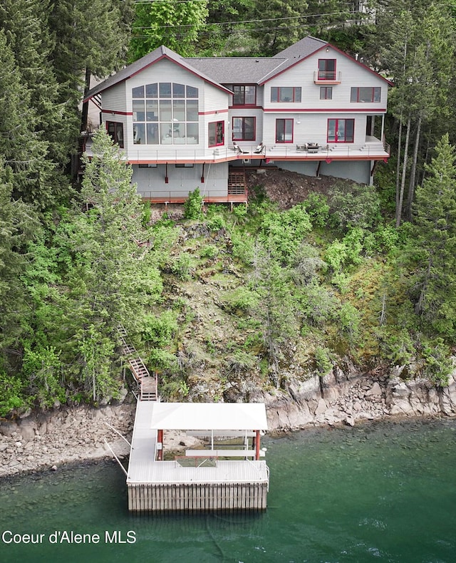 3361 Bottle Bay Rd, Sagle, ID 83860 - back of house featuring a water view and a view of trees