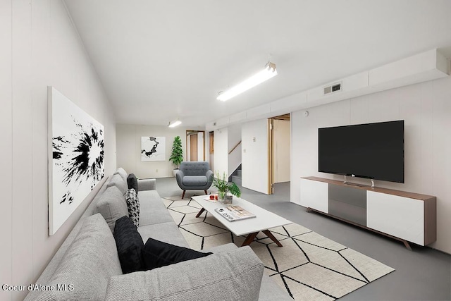 living area with stairs