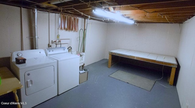 basement with separate washer and dryer