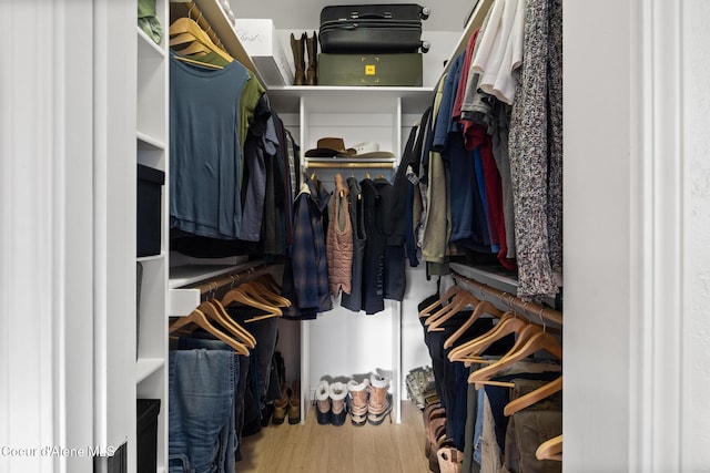 22385 N Ranch View Dr, Rathdrum, ID 83858 - walk in closet featuring wood finished floors