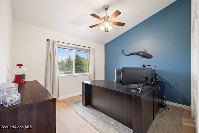 22385 N Ranch View Dr, Rathdrum, ID 83858 - office area featuring lofted ceiling, ceiling fan, baseboards, and wood finished floors