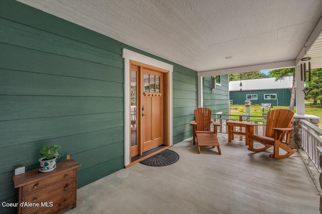 521 Shady Pines Loop, Priest Lake, ID 83856 - doorway to property with covered porch