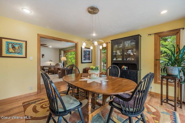 521 Shady Pines Loop, Priest Lake, ID 83856 - dining area with light wood finished floors, baseboards, and recessed lighting