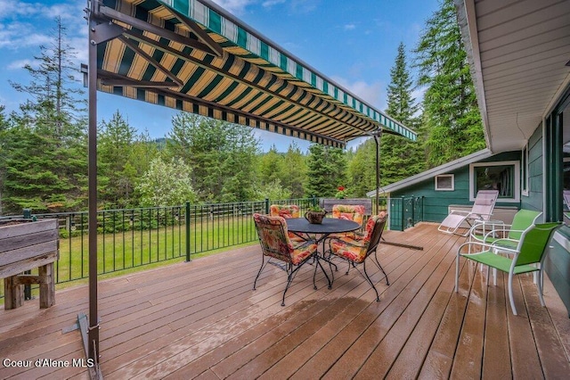 521 Shady Pines Loop, Priest Lake, ID 83856 - wooden terrace with outdoor dining area
