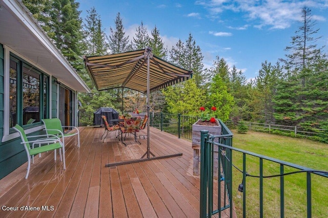 521 Shady Pines Loop, Priest Lake, ID 83856 - wooden deck with outdoor dining space and grilling area