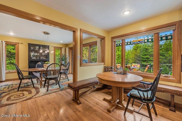 521 Shady Pines Loop, Priest Lake, ID 83856 - dining space featuring healthy amount of natural light, light wood-type flooring, and recessed lighting