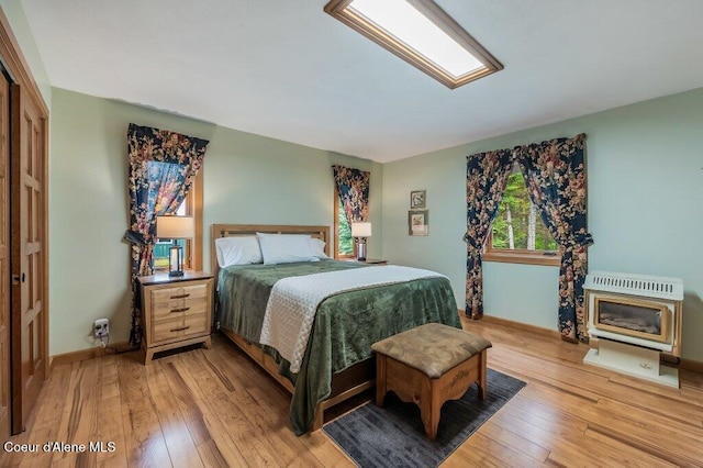 521 Shady Pines Loop, Priest Lake, ID 83856 - bedroom with light wood-style flooring and baseboards