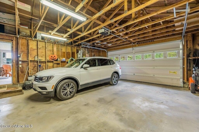 521 Shady Pines Loop, Priest Lake, ID 83856 - garage featuring a garage door opener