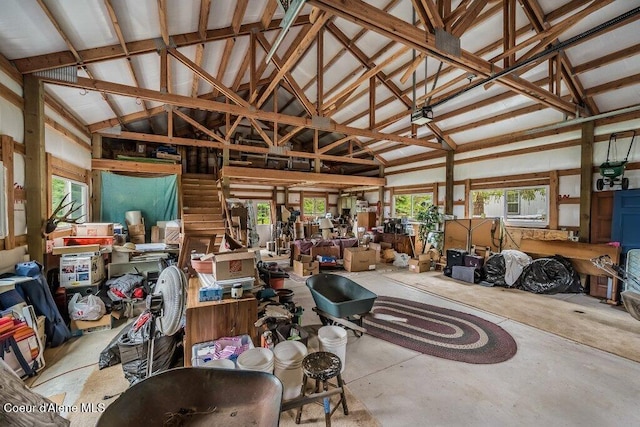 521 Shady Pines Loop, Priest Lake, ID 83856 - misc room with vaulted ceiling, concrete flooring, and plenty of natural light