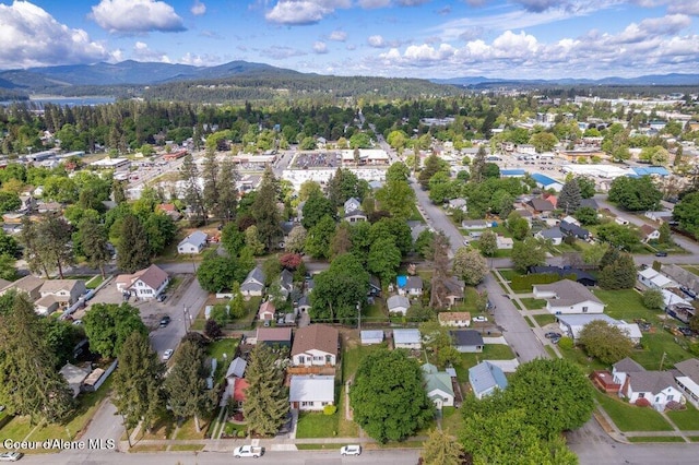 1315 N 7th St, Coeur Dalene, ID 83814 - aerial overview of property's location featuring mountains and nearby suburban area