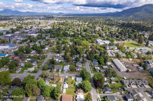 1315 N 7th St, Coeur Dalene, ID 83814 - aerial view of property's location with mountains and nearby suburban area