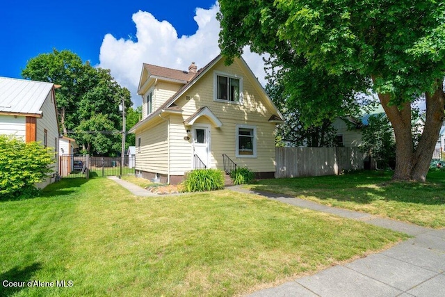 1315 N 7th St, Coeur Dalene, ID 83814 - bungalow with entry steps and a chimney