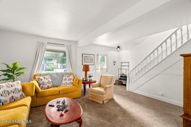 1315 N 7th St, Coeur Dalene, ID 83814 - living room featuring stairway, carpet flooring, and beam ceiling