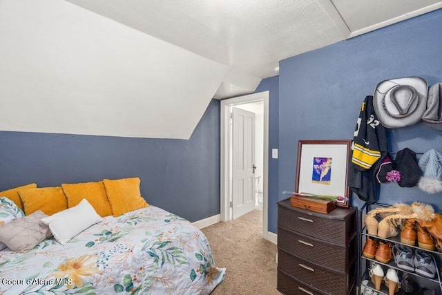 1315 N 7th St, Coeur Dalene, ID 83814 - carpeted bedroom with vaulted ceiling and baseboards