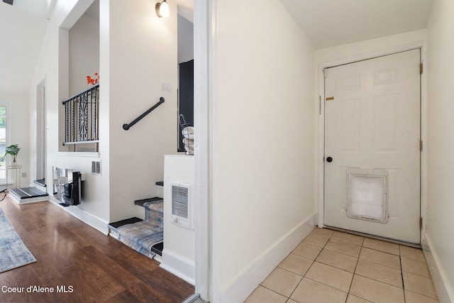 131 Ord Blvd, Nampa, ID 83686 - corridor with stairway, baseboards, and light wood-type flooring