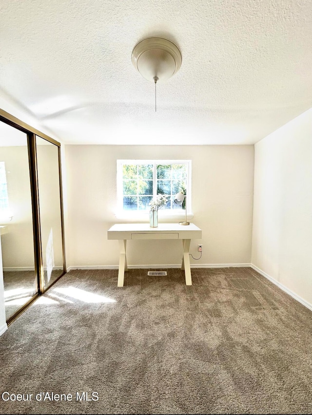 131 Ord Blvd, Nampa, ID 83686 - carpeted dining room featuring a textured ceiling and baseboards