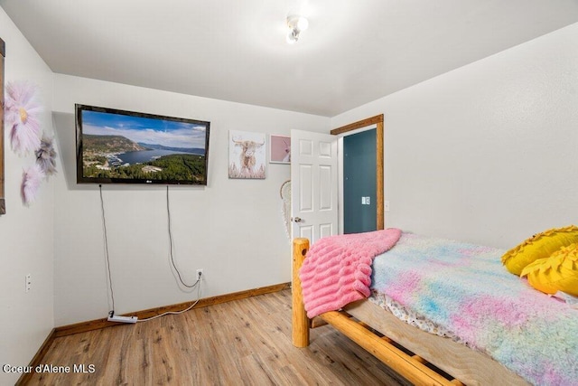 204 Sunrise Dr, Pinehurst, ID 83850 - bedroom featuring light wood-style flooring and baseboards