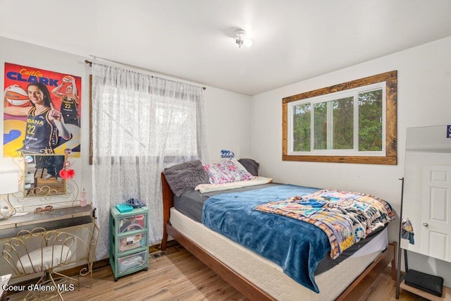 204 Sunrise Dr, Pinehurst, ID 83850 - bedroom with wood finished floors