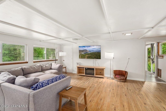204 Sunrise Dr, Pinehurst, ID 83850 - living area with light wood-style flooring, baseboards, coffered ceiling, and beamed ceiling