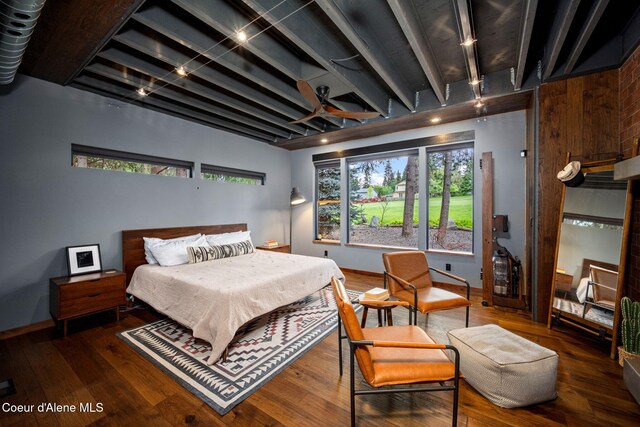 11679 N Avondale Loop, Hayden, ID 83835 - bedroom featuring wood finished floors and baseboards