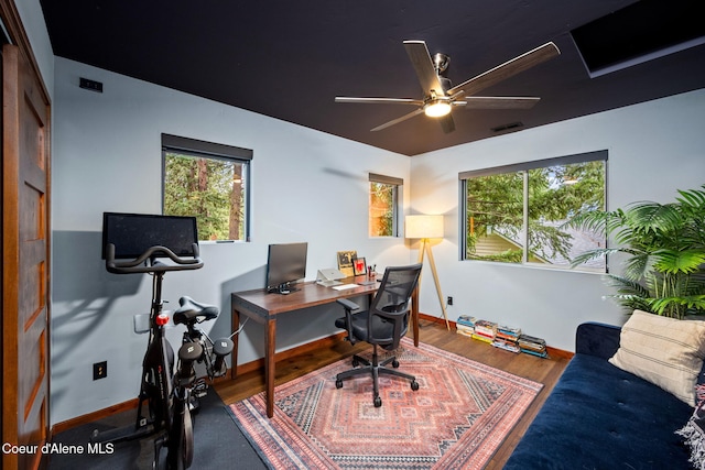 11679 N Avondale Loop, Hayden, ID 83835 - office area featuring a ceiling fan, wood finished floors, and baseboards