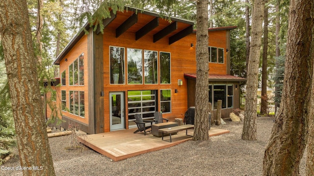 11679 N Avondale Loop, Hayden, ID 83835 - back of house with a deck