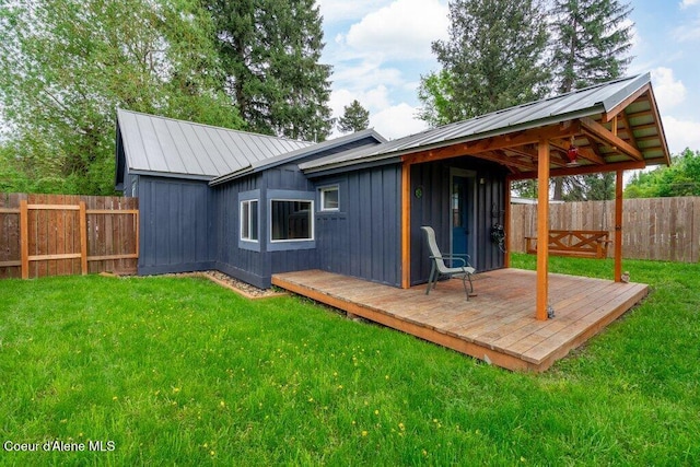 707 Washington Ave, Sandpoint, ID 83864 - rear view of house featuring board and batten siding and a wooden deck