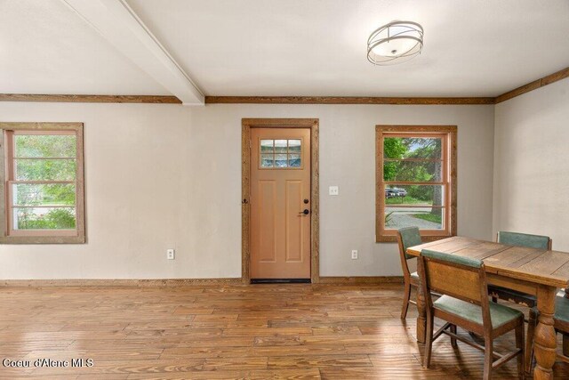 707 Washington Ave, Sandpoint, ID 83864 - foyer featuring hardwood / wood-style flooring, beamed ceiling, and baseboards