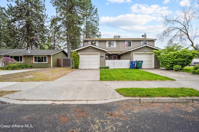 1706 E Thomas Ln, Coeur Dalene, ID 83815 - view of front of house featuring concrete driveway and a chimney