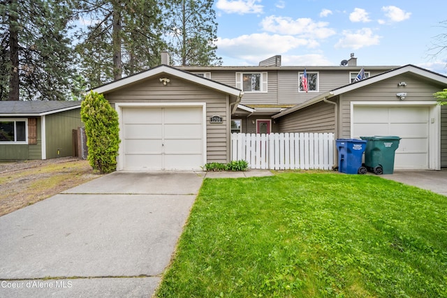 1706 E Thomas Ln, Coeur Dalene, ID 83815 - view of front of property with concrete driveway, a chimney, and an attached garage