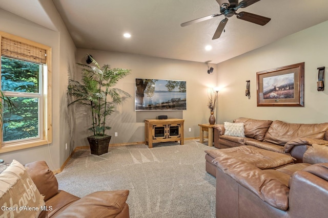 carpeted living room featuring a ceiling fan, baseboards, and recessed lighting