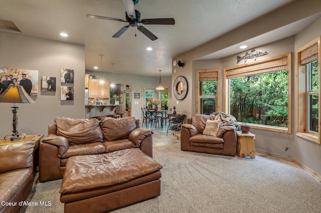 living room with recessed lighting, ceiling fan, carpet flooring, and baseboards