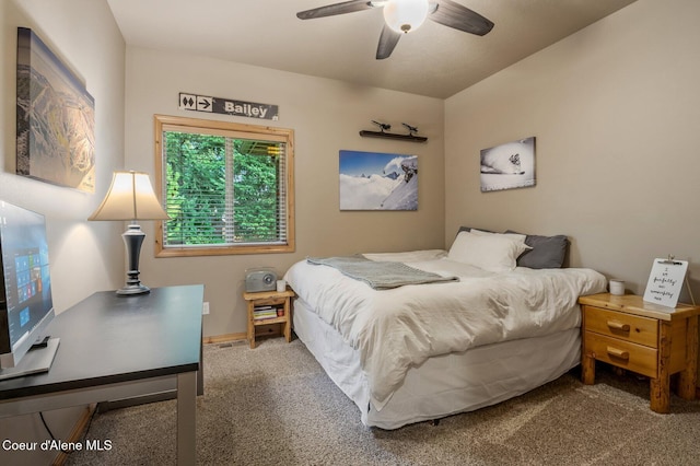 bedroom with carpet floors and a ceiling fan