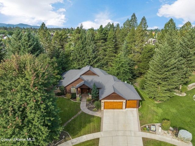 view from above of property featuring a forest
